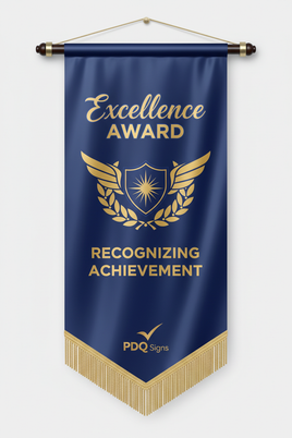 30" x 42" Satin Awards Banners have the highest quality dye sublimation paper transfer print. Banners can be sewn with a wood dowel top and/or bottom, straight or V cut bottom, and with or without fringe. Other options include decorative balls, spear tips, or metal eye hooks for hanging. Material options are Satin or Polyester Poplin (cotton look and feel). Uses include conferences, banquets, ceremonies, awards, and motivational. See page 10 of the catalog for illustrations and more details. PDQ Signs logo 