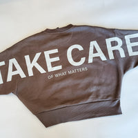 TAKE CARE OF WHAT MATTERS - Embroidered/Printed Crop Sweatshirt