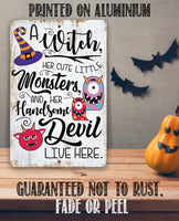 A Witch and Her Little Monsters - Metal Sign