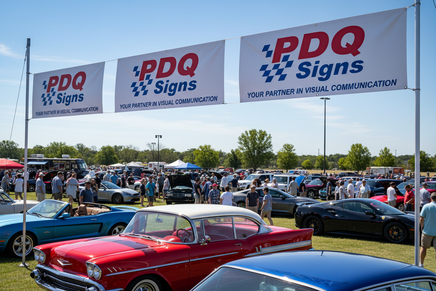 Vinyl banners hanging horizontal carshow outdoors background image with PDQ Signs logo advertisement